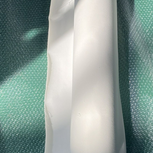 Capa de tecido multiel&aacute;stico branco importado