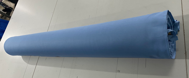 Capa de tecido el&aacute;stico de poli&eacute;ster azul celeste